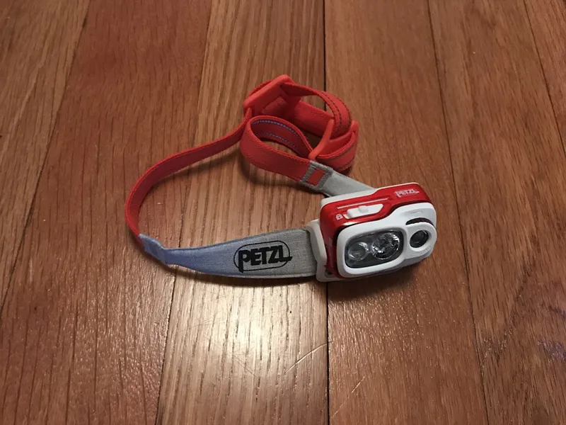 Headlamp and adjustable head strap for hiking gear rental in El Chaltén