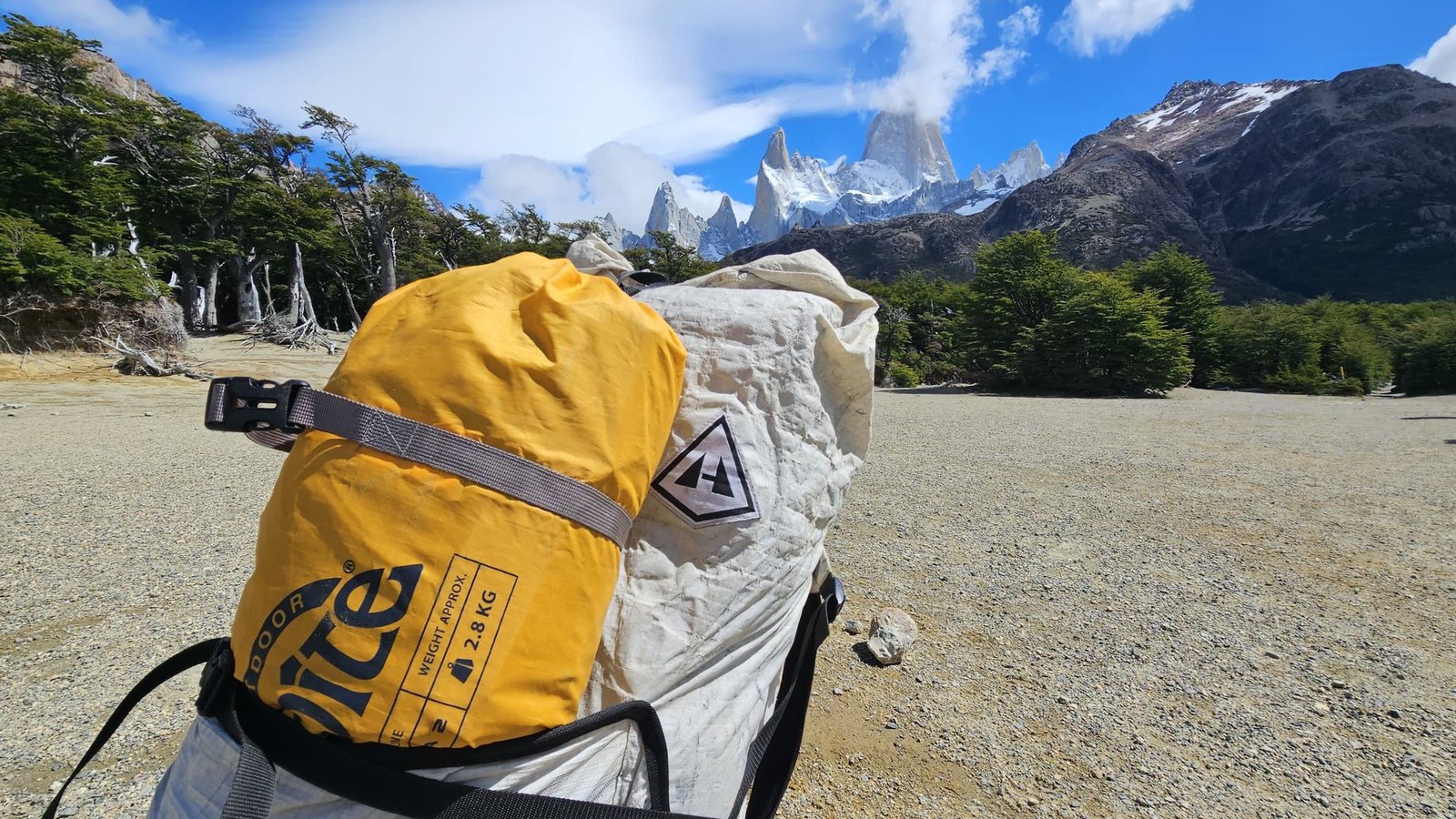 Packed porter bags with Fitz Roy in the background near El Chaltén
